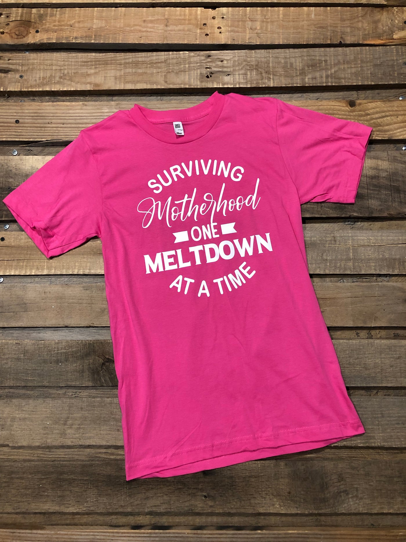 Surviving Motherhood Graphic Tee